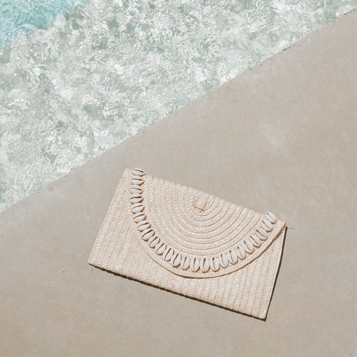 Sandi Cowrie Clutch