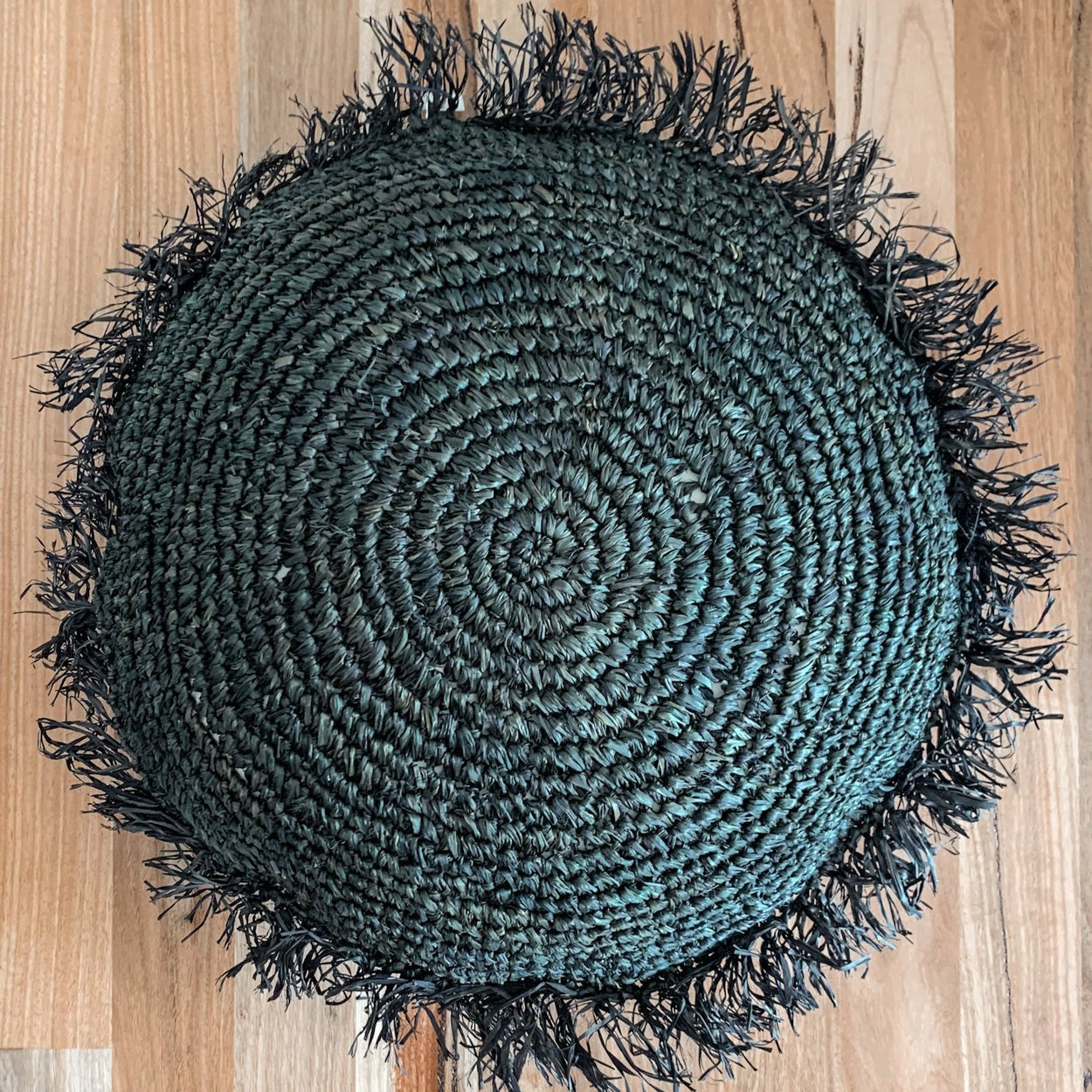 Raffia round cushion