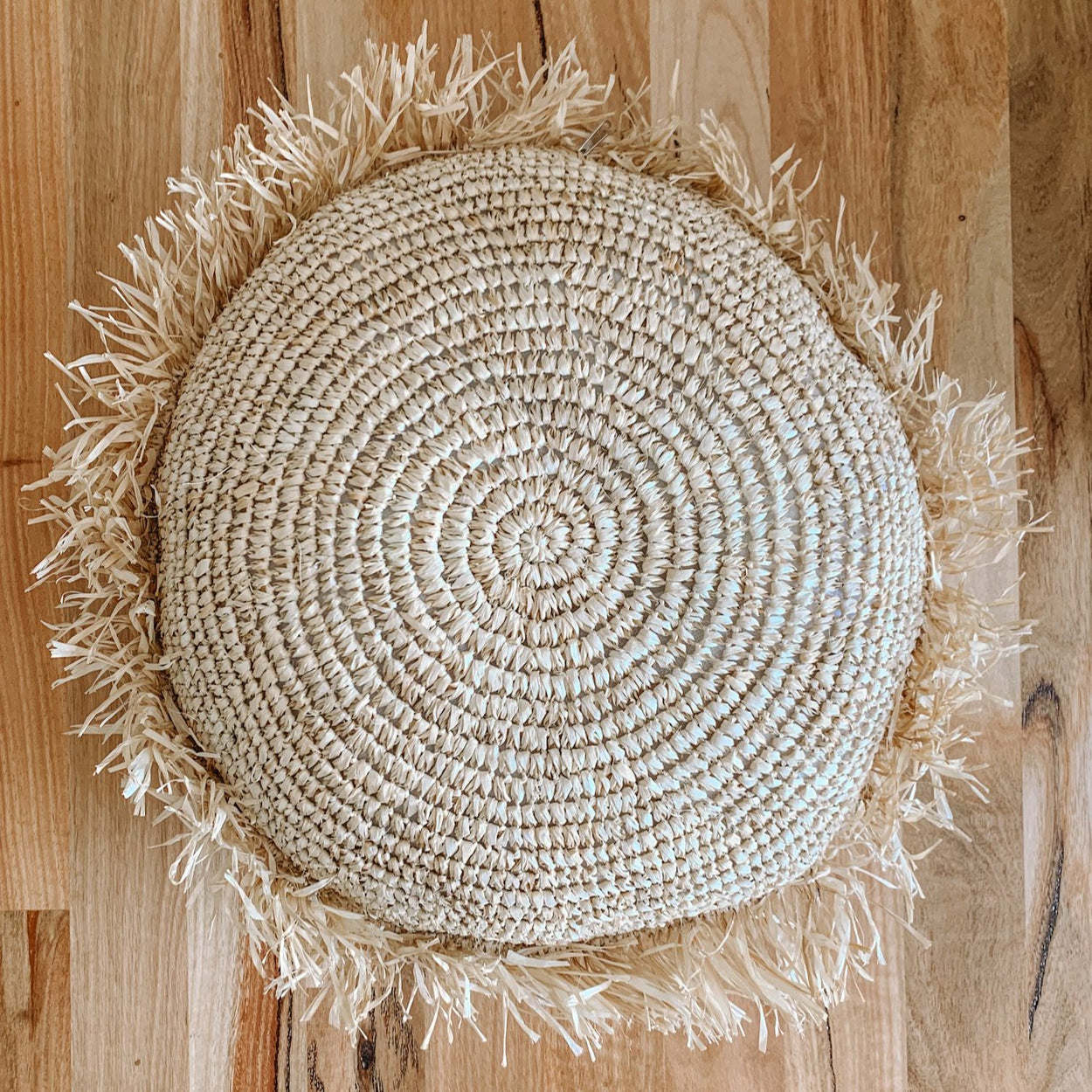 Raffia round cushion