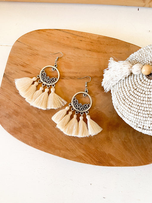 Earrings with cotton tassels